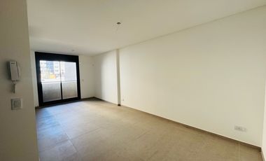 VENTA: Departamento de dos dormitorios, a estrenar, con balcón y cochera. Centro, Rosario