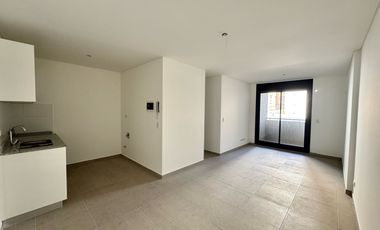 VENTA: Departamento de dos dormitorios, a estrenar, con balcón y cochera. Centro, Rosario