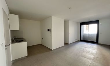 VENTA: Departamento de dos dormitorios, a estrenar, con balcón y cochera. Centro, Rosario