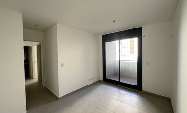 VENTA: Departamento de dos dormitorios, a estrenar, con balcón y cochera. Centro, Rosario