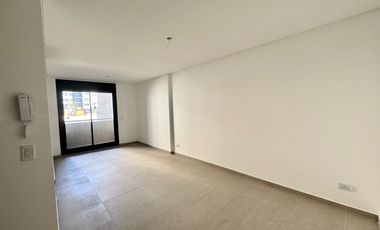 VENTA: Departamento de dos dormitorios, a estrenar, con balcón y cochera. Centro, Rosario