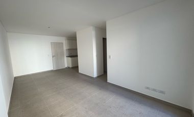 VENTA: Departamento de dos dormitorios, a estrenar, con balcón y cochera. Centro, Rosario