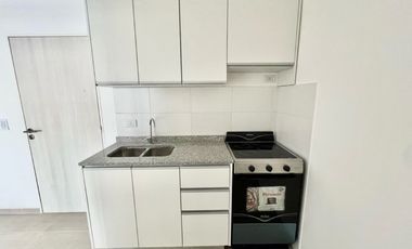 VENTA: Departamento de dos dormitorios, a estrenar, con balcón y cochera. Centro, Rosario