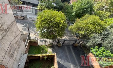 Departamento 2 ambientes con parrilla y cochera