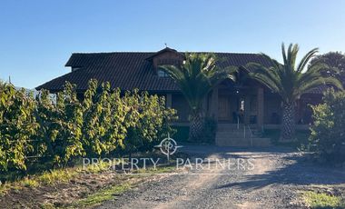 Espectacular parcela productiva con cerezos y casa en Teno