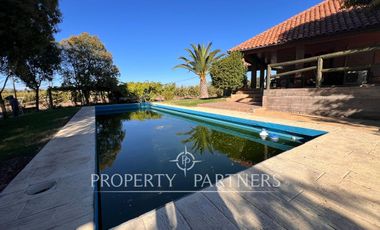 Espectacular parcela productiva con cerezos y casa en Teno