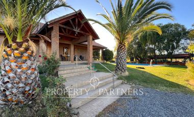 Espectacular parcela productiva con cerezos y casa en Teno