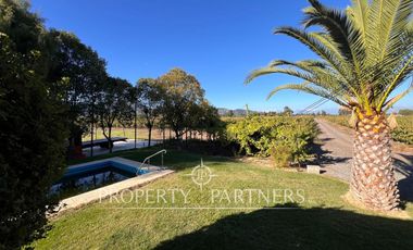 Espectacular parcela productiva con cerezos y casa en Teno