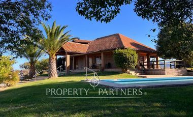 Espectacular parcela productiva con cerezos y casa en Teno