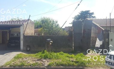 Amplio terreno con un galpon al fondo