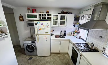 Departamento tres ambientes con cochera en alquiler