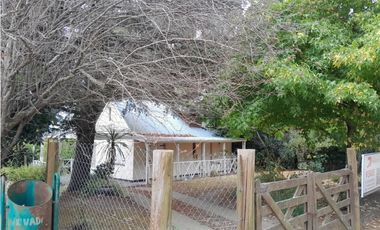 VENTA  APTO CREDITO CASA 3 AMBIENTES CON GRAN PARQUE Y PARRILLA