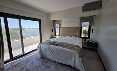 Casa Moderna Minimalista en Puerto Nizuc con lote al agua