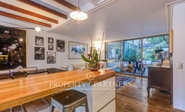 Exclusivo departamento en arriendo con patio privado en El Golf, Las Condes