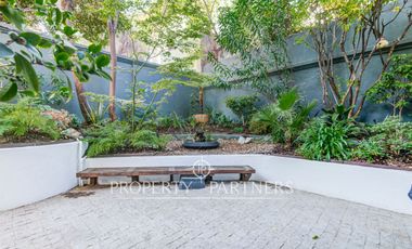 Exclusivo departamento en arriendo con patio privado en El Golf, Las Condes