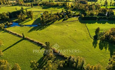 Precioso terreno plano de 11 hectareas subdividido en 17 lotes con laguna interior y orilla de rio