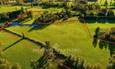 Precioso terreno plano de 11 hectareas subdividido en 17 lotes con laguna interior y orilla de rio