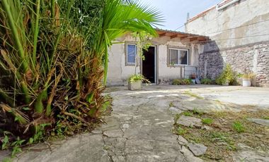 CASA MULTIFAMILIAR CON COCHERA CUBIERTA