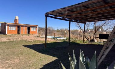 CASA CON CABAÑAS EN VENTA