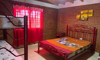 CASA CON CABAÑAS EN VENTA
