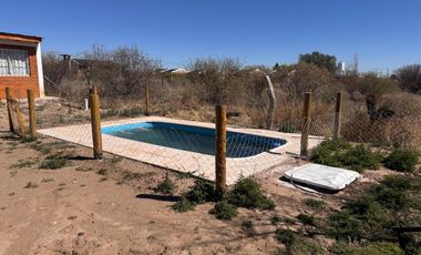 CASA CON CABAÑAS EN VENTA
