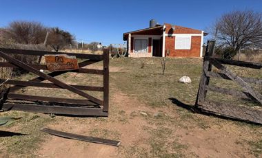 CASA CON CABAÑAS EN VENTA