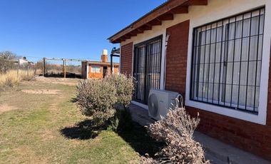 CASA CON CABAÑAS EN VENTA