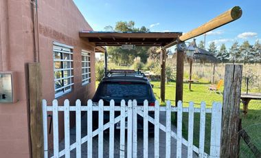 VENTA CASA 2 AMBIENTES C/ PARQUE Y PILETA EN MONTE
