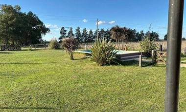 VENTA CASA 2 AMBIENTES C/ PARQUE Y PILETA EN MONTE