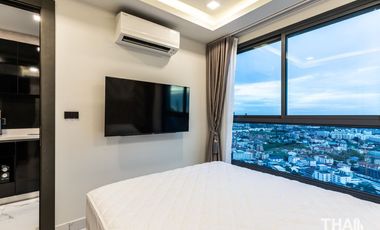 Compact 2 Bedroom, 1 Bathroom Condo with City and Sea View