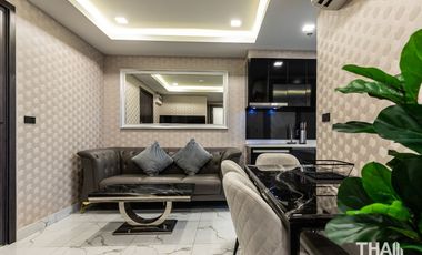 Compact 2 Bedroom, 1 Bathroom Condo with City and Sea View