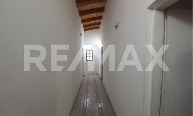 VENTA SALON COMERCIAL CON CASA Y GALPON NEUQUEN