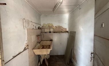 CASA EN VENTA EN BRAGADO CON PATIO Y GARAJE