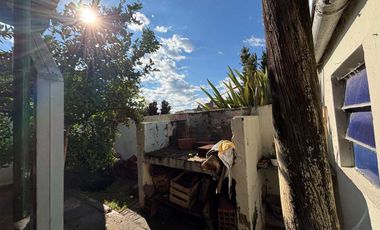 CASA EN VENTA EN BRAGADO CON PATIO Y GARAJE