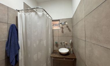 CASA EN VENTA EN BRAGADO CON PATIO Y GARAJE