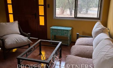 SE ARRIENDA amplia parcela en terreno plano con 2 casas