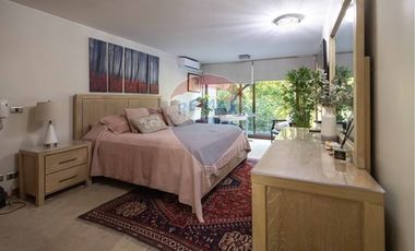 Departamento 2 pisos y jardín exclusivo, Vitacura