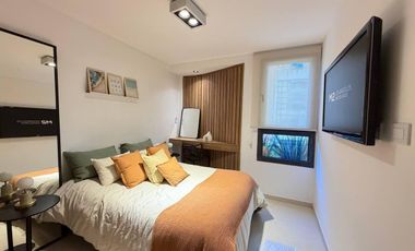 VENTA: departamento de dos dormitorios con pileta, patio y parrillero. Rosario, centro