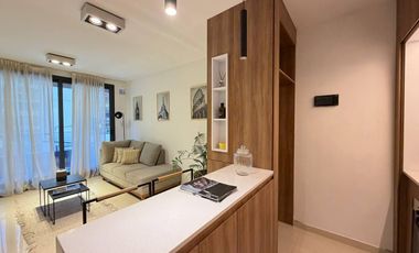 VENTA: departamento de dos dormitorios con pileta, patio y parrillero. Rosario, centro