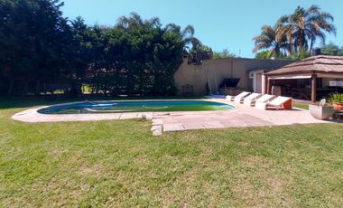 Gran terreno de 1.200m² con casa, quincho y pileta