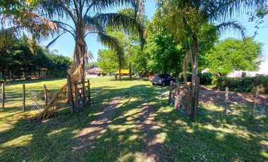 Gran terreno de 1.200m² con casa, quincho y pileta