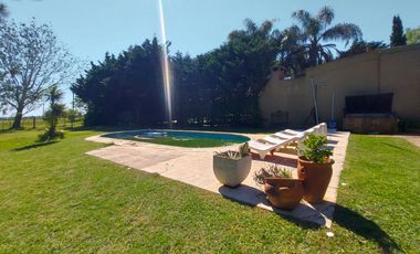 Gran terreno de 1.200m² con casa, quincho y pileta
