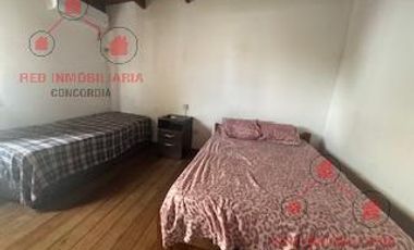 Propiedad con cinco departamentos. dos tienen dos dormitorios y dependencias y tres tienen un dormitorio. Todos amoblados, ideal para inversión.-