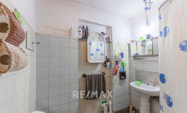 LOCAL COMERCIAL + CASA DOS DORMITORIOS  EN VENTA