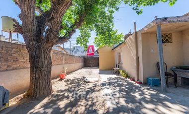 LOCAL COMERCIAL + CASA DOS DORMITORIOS  EN VENTA
