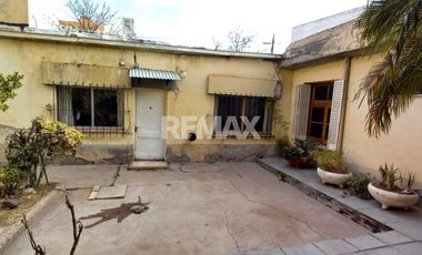 VENTA DE DOS LOCALES CON CASA
