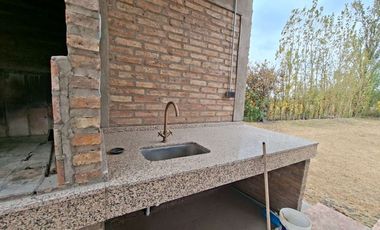 CASA, PISCINA Y QUINCHO EN TERRENO DE 2 HECTAREAS