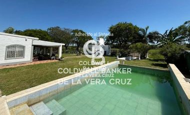 CASA, QUINCHO, PILETA Y BAJADA AL RIO .