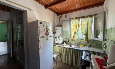 VENTA CASA Y LOTE EN SARANDI