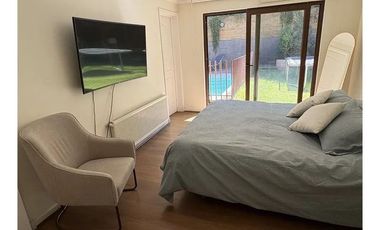 Casa 4D 3B con jardín en Lo Barnechea: Tu refugio en la cordillera